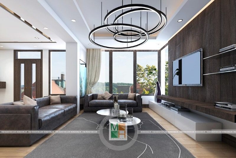 Mẫu thiết kế phòng khách của căn hộ hiện đại được nâng cao bởi bộ sofa bọc da cao cấp, tạo nên điểm nhấn nổi bật cho phòng.